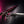 Moto Polished 440c Power Shear, 7-inch, left-handed, on dark brushed steel under magenta light